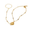 Wholesale Women's Light Luxury Stainless Steel Electroplated Geometric Zircon Embellished Interlocking Bracelet With Shell Pendant