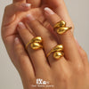 Wholesale Women's Light Luxury Stainless Steel Geometric Hollow Opening Comma Drop Tail Ring Electroplated With 18K Gold