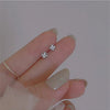 Wholesale Women's Light Luxury Sterling Silver Earrings With Flower Pattern And Zircon Inlay
