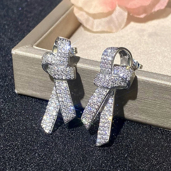 Wholesale Women's Light Luxury Style Copper Earrings With Microinlaid Zircon And Bow Tie Geometric Design