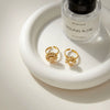 Wholesale Women's Light Luxury Style Electroplated Stainless Steel Flower Pattern Rotating Ring Jewelry