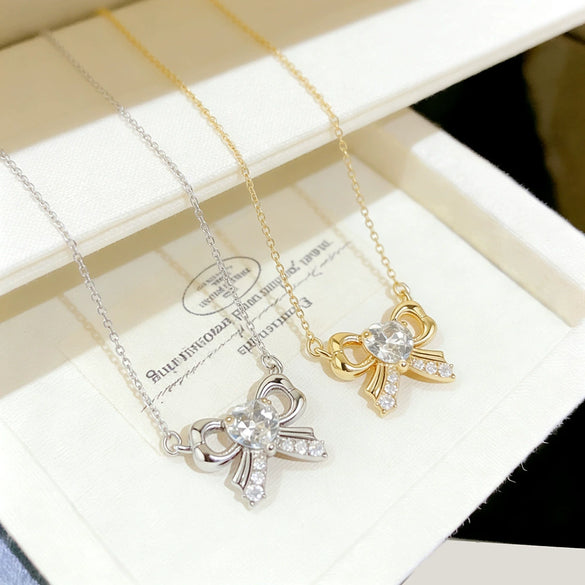 Wholesale Women's Light Luxury Style Irregular Love Heart Bow Titanium Steel Necklace With Zircon Inlaid Pendant And Oshaped Chain