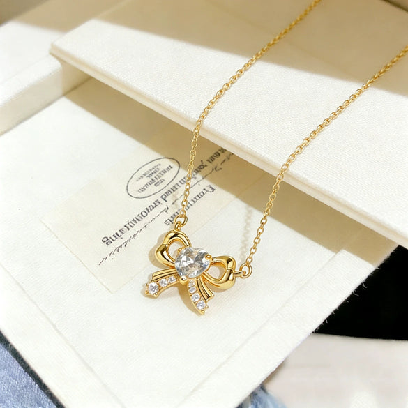 Wholesale Women's Light Luxury Style Irregular Love Heart Bow Titanium Steel Necklace With Zircon Inlaid Pendant And Oshaped Chain