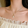 Wholesale Women's Light Luxury Style Titanium Steel Necklace With Zirconinlaid Copper Flowers Pendant And Water Wave Chain