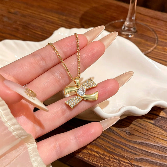 Wholesale Women's Light Luxury Titanium Steel Necklace With Oshaped Chain And Copper Zirconinlaid Letter Heart Pendant