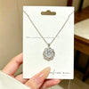 Wholesale Women's Light Luxury Titanium Steel Rotating Flower Necklace With Zircon Inlay