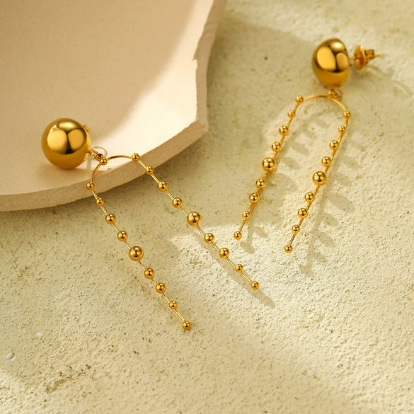 Wholesale Women's Light Luxury Titanium Steel Round Bead Tassel Earrings With Electroplating