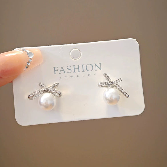 Wholesale Women's Light Luxury Zinc Alloy Rhinestone Bow Pearl Earrings With Electroplating