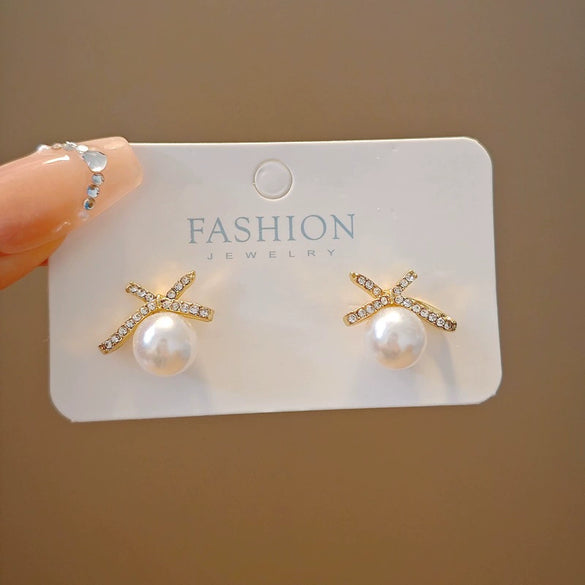 Wholesale Women's Light Luxury Zinc Alloy Rhinestone Bow Pearl Earrings With Electroplating