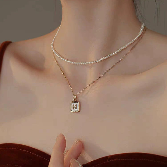 Wholesale Women's Luxury Titanium Steel Letterinlaid Ochain Necklace With Gold Plated Electroplating