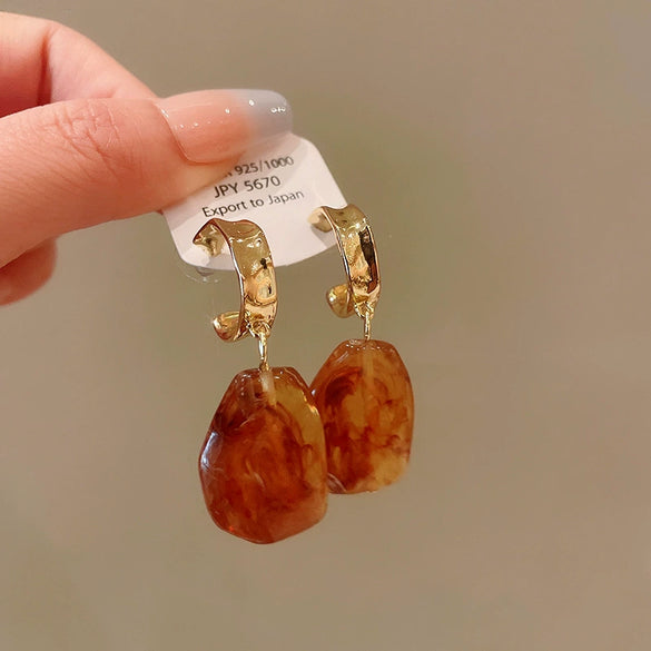 Wholesale Women's Maillard Style Alloy Geometric Tiger Eye Earrings With Electroplating