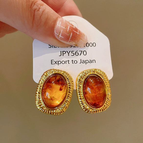 Wholesale Women's Maillard Style Alloy Geometric Tiger Eye Earrings With Electroplating