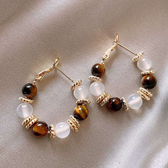 Wholesale Women's Maillard Style Alloy Geometric Tiger Eye Earrings With Electroplating