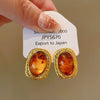 Wholesale Women's Maillard Style Alloy Geometric Tiger Eye Earrings With Electroplating