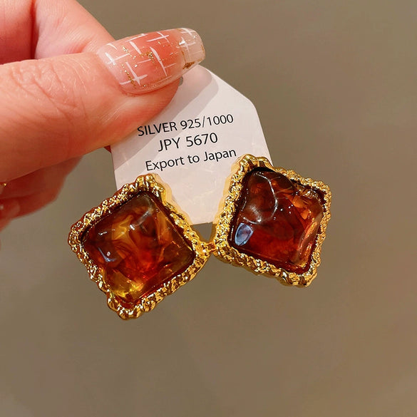 Wholesale Women's Maillard Style Alloy Geometric Tiger Eye Earrings With Electroplating