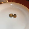 Wholesale Women's Maillard Style Alloy Geometric Tiger Eye Earrings With Electroplating