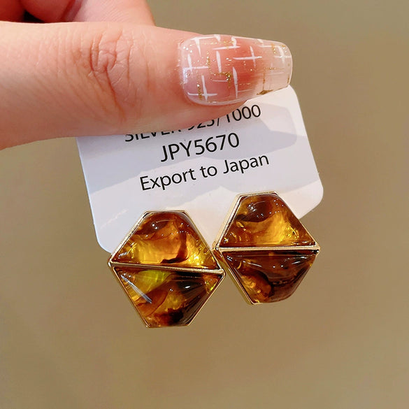 Wholesale Women's Maillard Style Alloy Geometric Tiger Eye Earrings With Electroplating