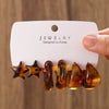 Wholesale Women's Maillard Style Geometric Leopardprint Resin Cshaped Electroplated Ear Clips