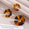 Wholesale Women's Maillard Style Geometric Leopardprint Resin Cshaped Electroplated Ear Clips