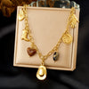 Wholesale Women's Medieval Style Gold Plated Stainless Steel Cross Cowboy Elements Pendant Necklace With Oshaped Chain