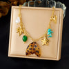 Wholesale Women's Medieval Style Goldplated Stainless Steel Star And Heart Shape Multipendant Necklace With Flat Cross Chain