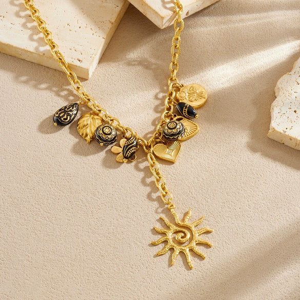 Wholesale Women's Medieval Style Heart Shape Black Carved Geometric Goldplated Stainless Steel Spiral Sun Flower Leaf Pendant Necklace With Oshaped Chain