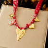 Wholesale Women's Medieval Style Heartshaped Printed Ceramic Goldplated Stainless Steel Love Necklace