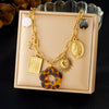 Wholesale Women's Medieval Style Leopard Print Stainless Steel Electroplated Flower Square Oval Sun Necklace With Flat Cross Chain