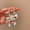 Wholesale Women's Metal Electroplated Bow Shape Pearl Tassel Earrings Light Luxury Style