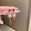Wholesale Women's Metal Electroplated Bow Shape Pearl Tassel Earrings Light Luxury Style