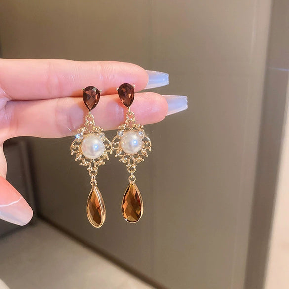 Wholesale Women's Metal Electroplated Bow Shape Pearl Tassel Earrings Light Luxury Style
