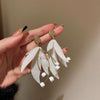 Wholesale Women's Metal Electroplated Bow Shape Pearl Tassel Earrings Light Luxury Style