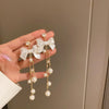 Wholesale Women's Metal Electroplated Bow Shape Pearl Tassel Earrings Light Luxury Style