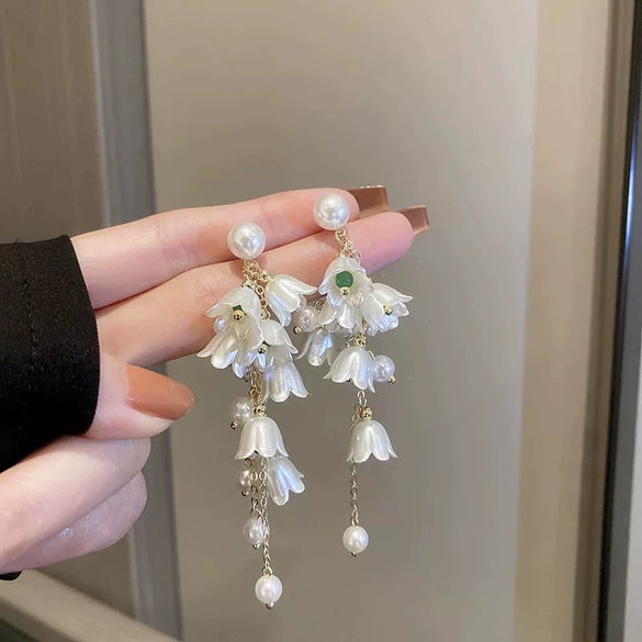 Wholesale Women's Metal Electroplated Bow Shape Pearl Tassel Earrings Light Luxury Style