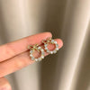 Wholesale Women's Metal Electroplated Bow Shape Pearl Tassel Earrings Light Luxury Style