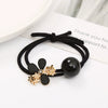 Wholesale Women's Metal Hair Rubber Band With Camellia Design And Electroplating Treatment