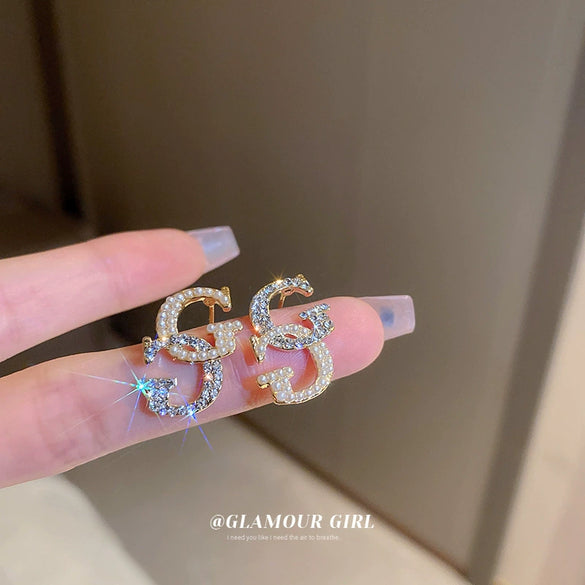 Wholesale Women's Metal Letter Earrings With 925 Silver Needles And Electroplating Simple Style