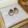 Wholesale Women's Metal Letter Earrings With 925 Silver Needles And Electroplating Simple Style