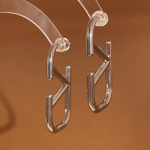 Wholesale Women's Metal Letter Earrings With 925 Silver Needles And Electroplating Simple Style