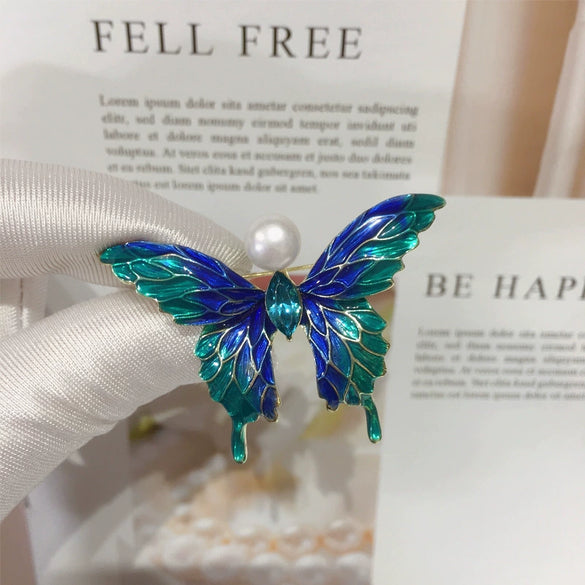 Wholesale Women's Minimalist Alloy Natural Pearl And Freshwater Pearl Brooch With Sapphire Blue Butterfly Design And Electroplating Finish