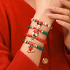 Wholesale Women's Minimalist Christmas Polymer Clay Bracelet With Snowflake And Christmas Tree Pendant