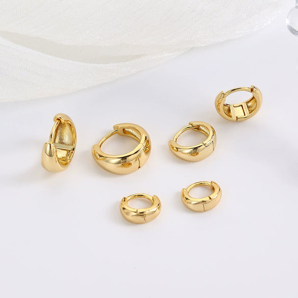 Wholesale Women's Minimalist Copper Zircon Geometric Round Ear Buckle Earrings With Real Gold Plated Electroplating Treatment