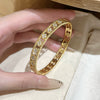 Wholesale Women's Minimalist Light Luxury Brass Microinlaid Fourpetal Flower Bracelet