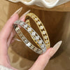Wholesale Women's Minimalist Light Luxury Brass Microinlaid Fourpetal Flower Bracelet