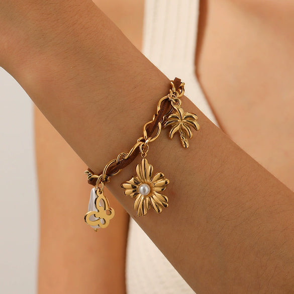 Wholesale Women's Multielement Retro Goldplated Stainless Steel Bracelet With Flower And Butterfly Pendant In Maillard Style