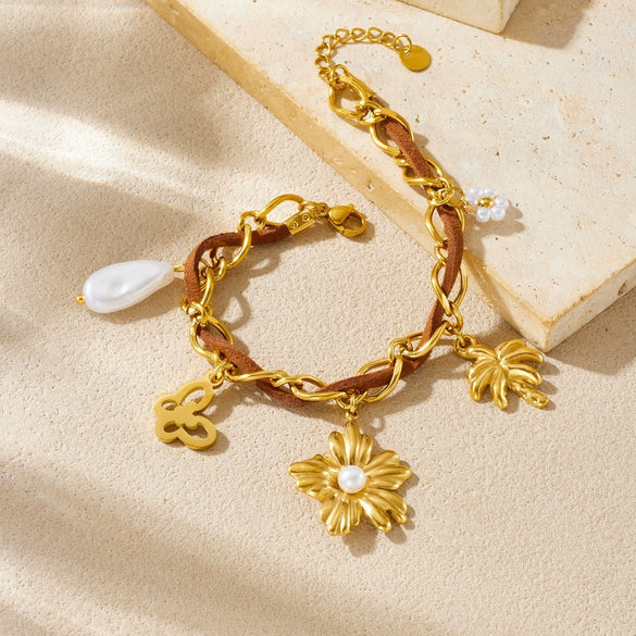 Wholesale Women's Multielement Retro Goldplated Stainless Steel Bracelet With Flower And Butterfly Pendant In Maillard Style