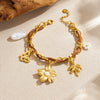 Wholesale Women's Multielement Retro Goldplated Stainless Steel Bracelet With Flower And Butterfly Pendant In Maillard Style