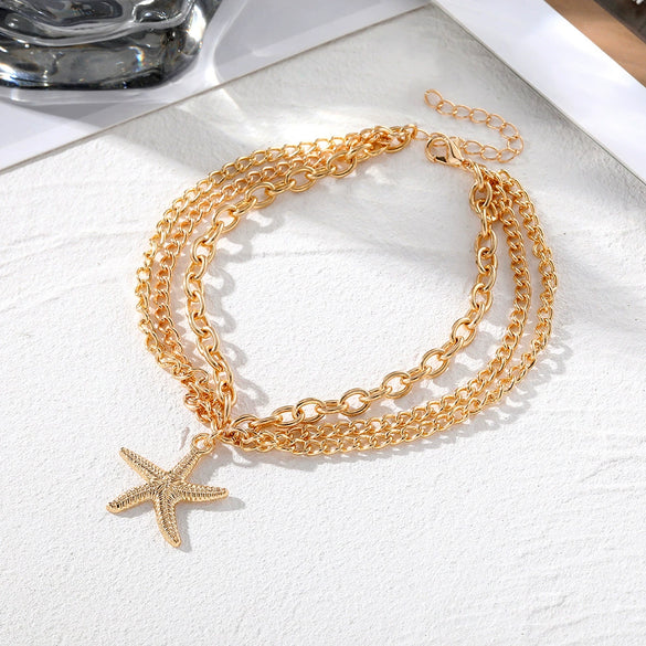 Wholesale Women's Multilayer Alloy Anklet With Hollow Chain Tassel Starfish Pendant And Geometric Design