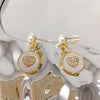 Wholesale Women's Natural Freshwater Pearl Earrings In Oblate Shape S925 Sterling Silver Color Retaining
