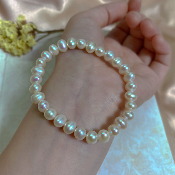 Wholesale Women's Natural Freshwater Pearl Stretch Bracelet With Elastic Cord Nearly Round Shape Simple Style